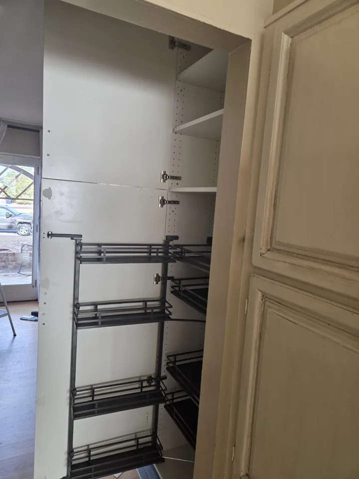 Full-height cabinet storage wall installed by Wagner Home Services