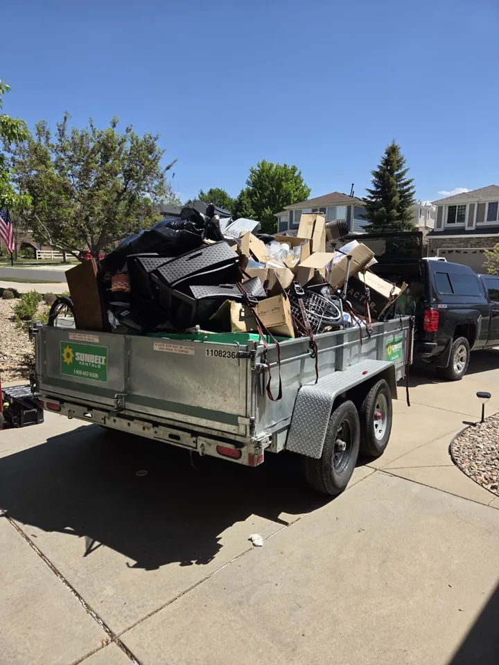 Trailer loaded for a household junk removal project